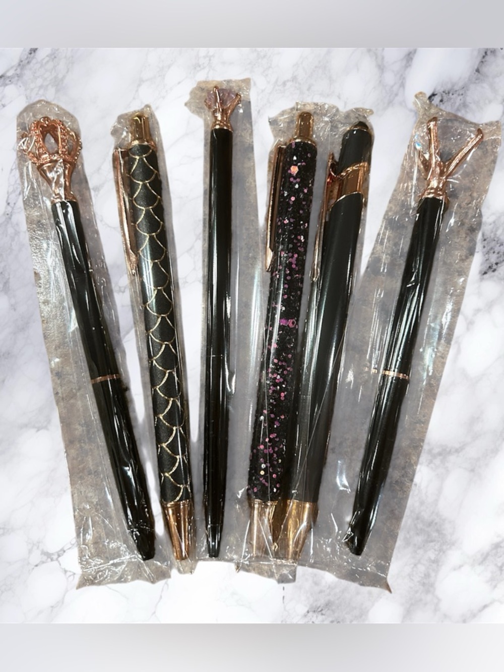 Pens, Rose Gold and black. $8
